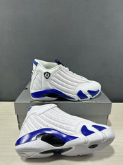 Angled view showing one sneaker upright and another tilted to reveal the outsole pattern.