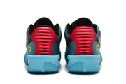Rear view of the blue sneakers showing red heel panels, textured detailing, and yellow side symbols.
