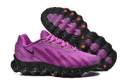 Purple Nike Air Max DN 8 sneakers showing the side profile and outsole.