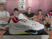 Lateral side view of a white Nike basketball sneaker showing the swoosh, red lining, and contrasting navy and lime-green outsole sections.