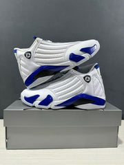 Two sneakers displayed together, showing the side panels, blue accents, and outsole edges.