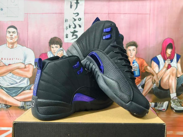 Pair of black high-top sneakers with blue-purple accents displayed on a shoebox.