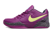 Side view of purple Nike Ja 2 shoe with a bright contrasting side logo