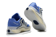 Blue and white Nike KD 18 sneakers showing the rear and outsole.