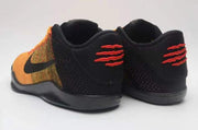 Rear view of Nike Kobe 11 shoes showing black heels with red accents