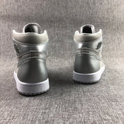 Rear view of the high-top sneakers showing the contrasting heel panels, collars and rubber outsoles.