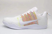 Side profile of a white low-top sneaker with a multicolor panel and Swoosh detail.
