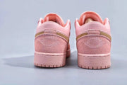 Rear view showing pink heel panels, collars and gold accent strips.