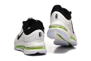 Rear view of Nike Pegasus Premium shoes showing white heel panels and translucent green midsole sections.