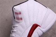 Close-up of the white textured upper, translucent lace hardware, and red side-panel accent.