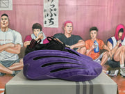 Side profile showing the purple textured upper, black side inserts, and sculpted outsole.