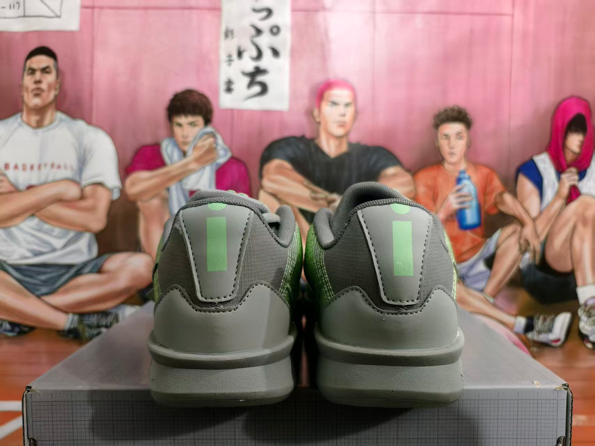 Rear view of grey and green Nike Kobe basketball shoes