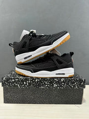 Stacked pair showing the lateral side design, black upper, white midsole, and gum outsole.
