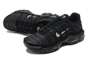 Pair of black mesh-patterned sneakers in a three-quarter view