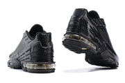 Rear views of black Nike Air Max Plus III sneakers with visible cushioning units.