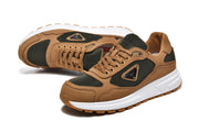 Pair of brown and dark green-black low-top sneakers in a three-quarter view.