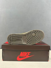 Outsole view showing the circular traction pattern and black rubber tread.
