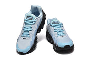 Front view of the light blue Nike Air Max DN sneakers with blue laces.