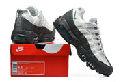 Nike Air Max 95 TT sneakers displayed beside a box labeled HM4740-103; the box shows a sample size of US 8.5