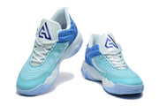 Pair of aqua-blue Nike shoes shown from front and side angles