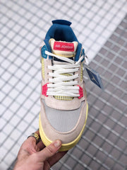 Top view showing the white laces, red Air Jordan tongue label, mesh toe, and contrasting lace clips.
