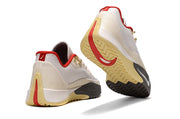 Rear and outsole views of the cream Nike S.T. Flare EP shoes.