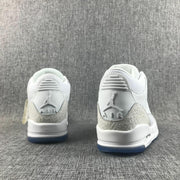 Rear view showing Jordan heel branding, white collars, and gray textured heel panels.