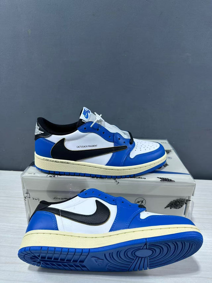 Pair of blue and white low-top sneakers shown from the side on a branded shoe box.