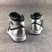 Rear view of the pair showing matching metallic silver heel panels and black padded collars.