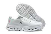 White On Cloudmonster 3 shoes shown from the side with the outsole visible.