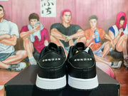 Rear view showing Jordan branding on the black heel panels and white midsoles.