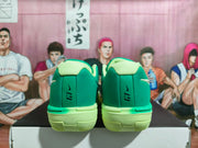 Rear view of green Nike basketball shoes with lime-colored soles.