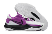 Purple and white basketball shoe with black accents and a white patterned outsole.