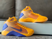 Two angled views highlighting the shoe's side panels and color blocking