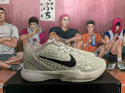 Side view of one Nike All-Star 2.0 sneaker showing the black Swoosh, raised star-pattern upper and sculpted sole.