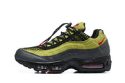 Side profile of a green and anthracite Nike Air Max 95 TT sneaker
