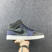 Side view of gray and purple Jordan 1 Mid-style sneakers with black Swoosh, black laces, and white sole.