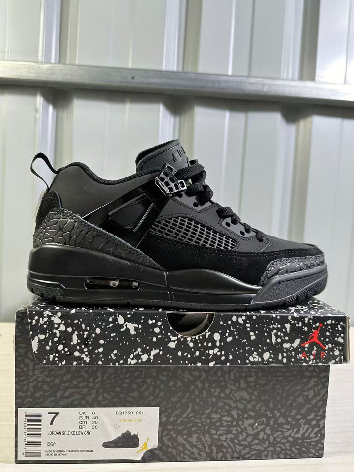 Black Jordan Spizike Low sneaker displayed on a patterned shoebox with a visible box label showing UK 6, EUR 40, CM 25, BR 38, and style code FQ1759 001.