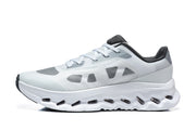 Side profile of a white and grey Cloudtilt Remix sneaker.