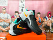 Pair of black Nike high-top basketball shoes with gray heels, turquoise trim, and gradient Swoosh logos.