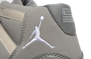 Close-up of the gray heel area with an embroidered basketball player logo and patterned collar panel.