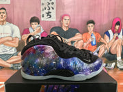 Side view showing the blue, purple and burgundy galaxy-patterned shell, white speckling and Nike swoosh.