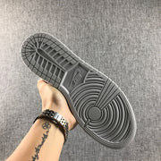 Close-up of the gray rubber outsole with circular traction detailing and a visible Nike mark.