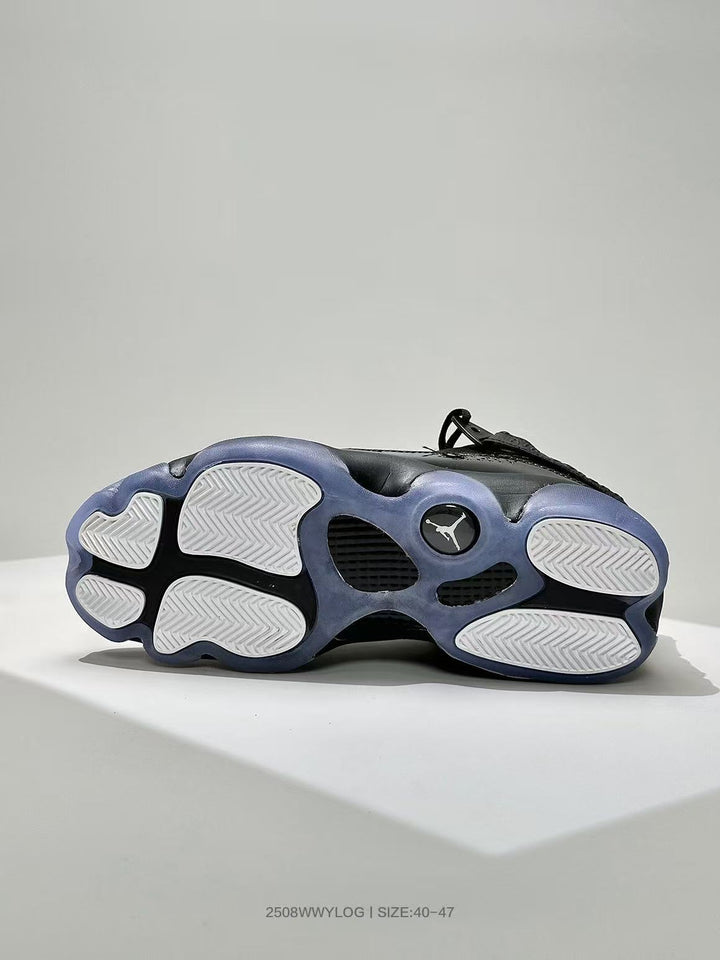 Outsole view of black Jordan 6 sneakers with white and translucent blue traction sections; image text states size 40–47.