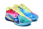 Angled pair view highlighting the bright multicolor uppers, neon-yellow laces, and contrasting side panels.