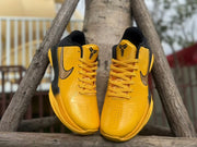 Front view showing perforated toe areas, laces, and tongue logos.