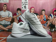 White and silver basketball shoes displayed at an angle