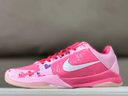 Side view of pink Nike Kobe 5 shoes with heart graphics and a white Swoosh