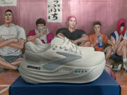 Side profile of a white Brooks running shoe with visible side branding and a sculpted midsole.