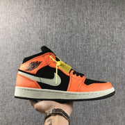Side view of an orange and black mid-top Jordan sneaker with a light-colored Swoosh and white midsole.